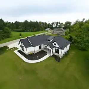 Drone view of residential home after HVAC service from ENG Heating & Cooling.