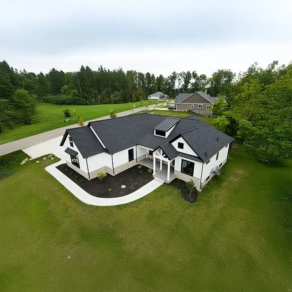 Drone view of residential home after HVAC service from ENG Heating & Cooling.